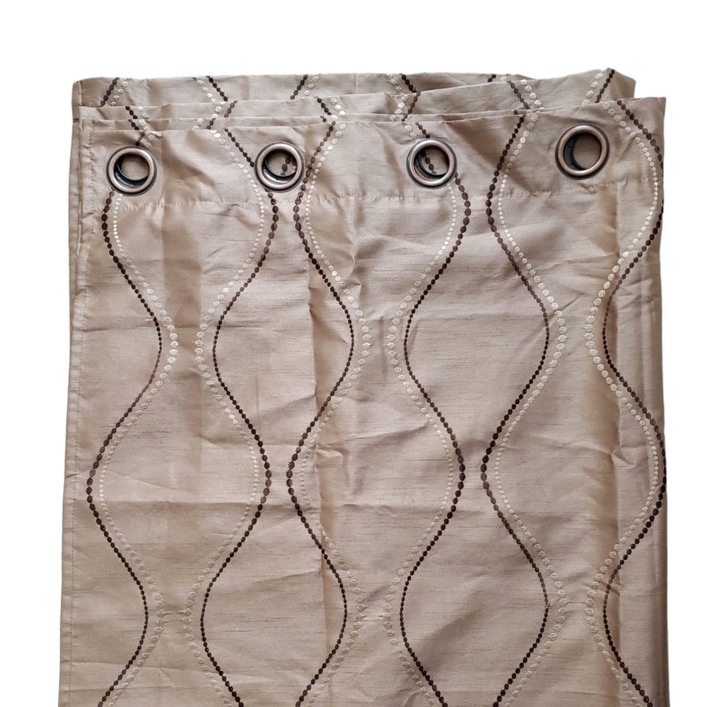 BROWN and cream stitching on tan drapes.